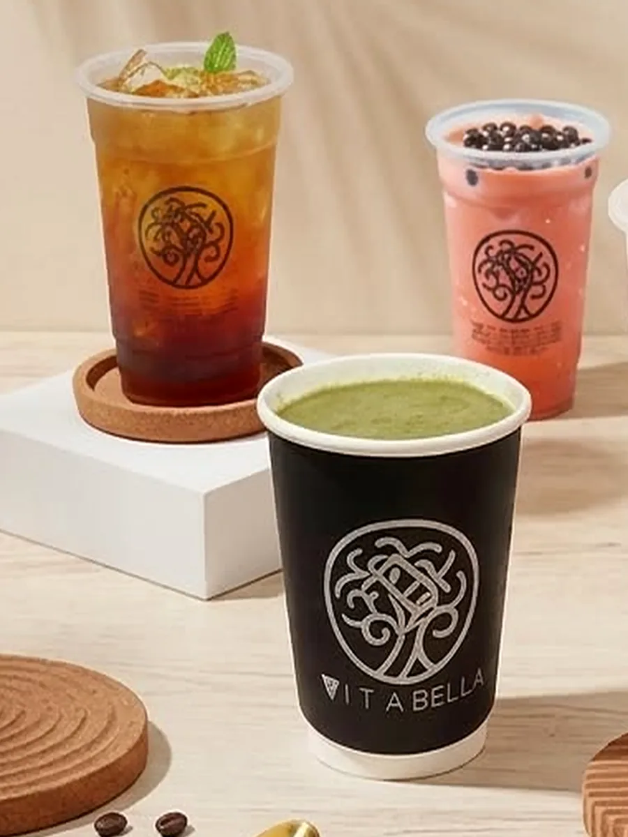 Vita Bella iced coffee and milk tea served on wooden coasters