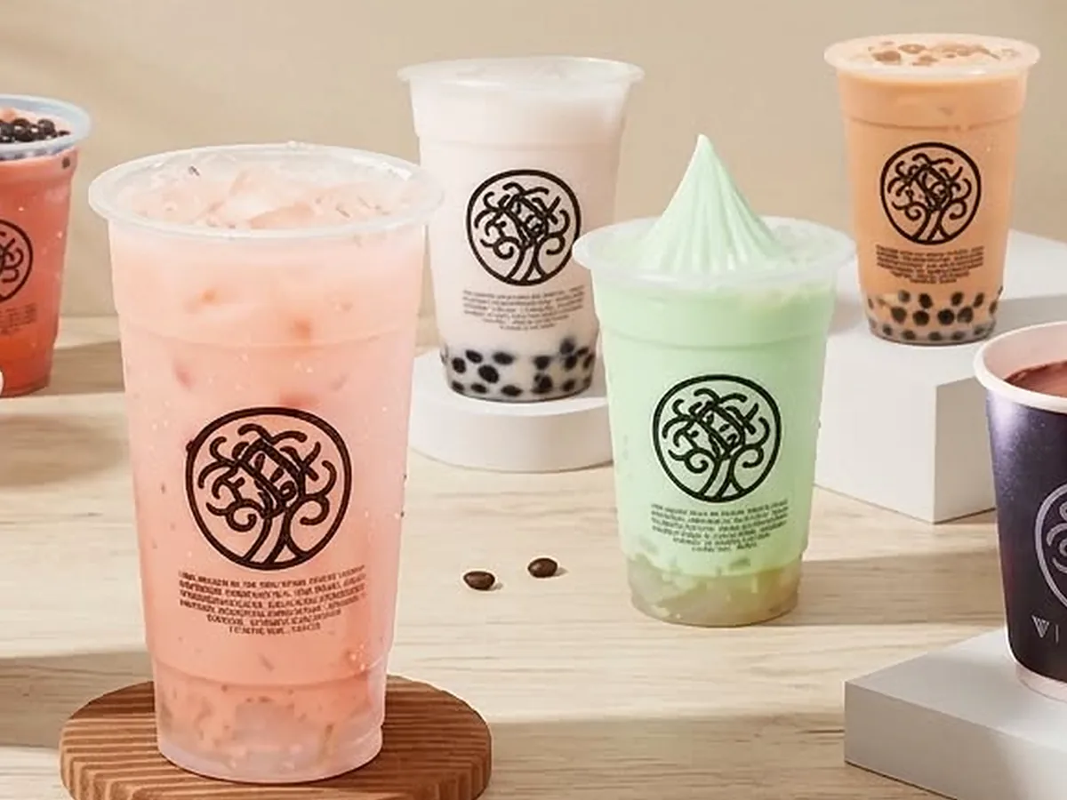 The Vita Bella line-up — pink milk tea, matcha and pearl drinks side by side